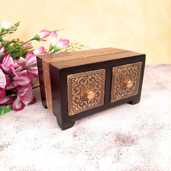 A bone-inlaid Indian jewellery box, 18th/19th century Rectangular wooden  body, the lid and sides with sumptuous bone inlays of flowering blossoms.  The edges reinforced by four inset brass bands at each corner.